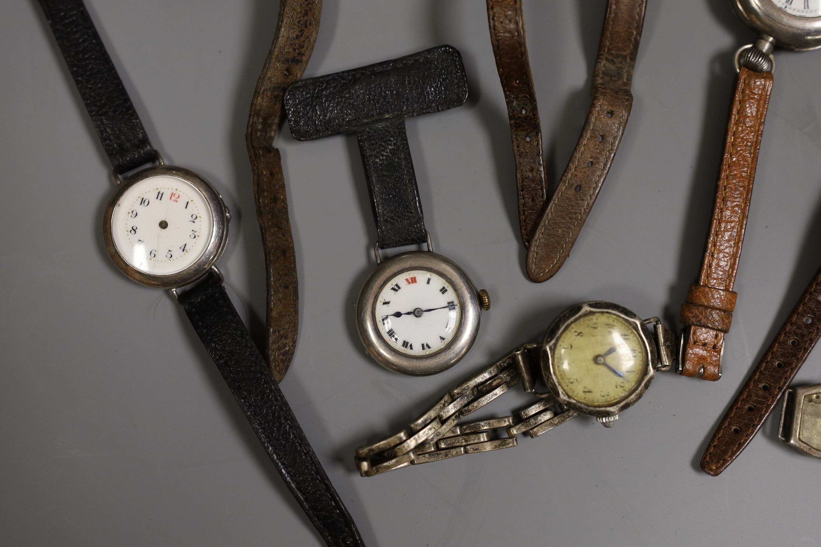 A small collection of ten assorted early 20th century wrist watches including trench style and seven other wrist watches (a.f.).